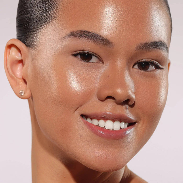 HY-GEN Skincare Infused Glow Beautifier in shade 02 model look on a white background.