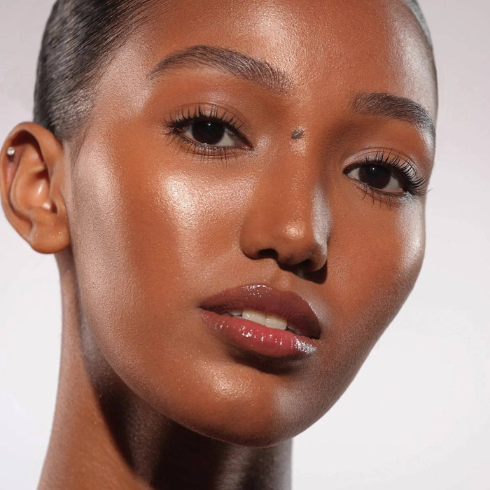HY-GEN Skincare Infused Glow Beautifier in shade 03 model look on a white background.