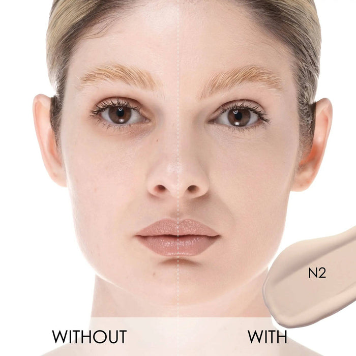 A split-screen with-and-without demonstration of the HY-GLAM Concealer in shade N2 on a model's face.