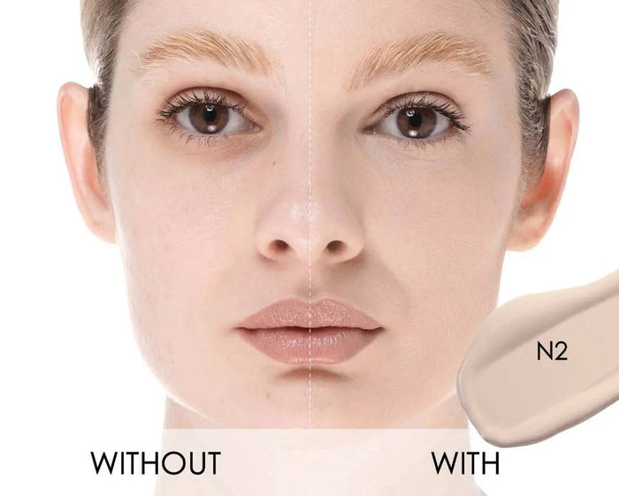 With-and-without comparison of HY-GLAM Concealer in shade N2 on a model's face.
