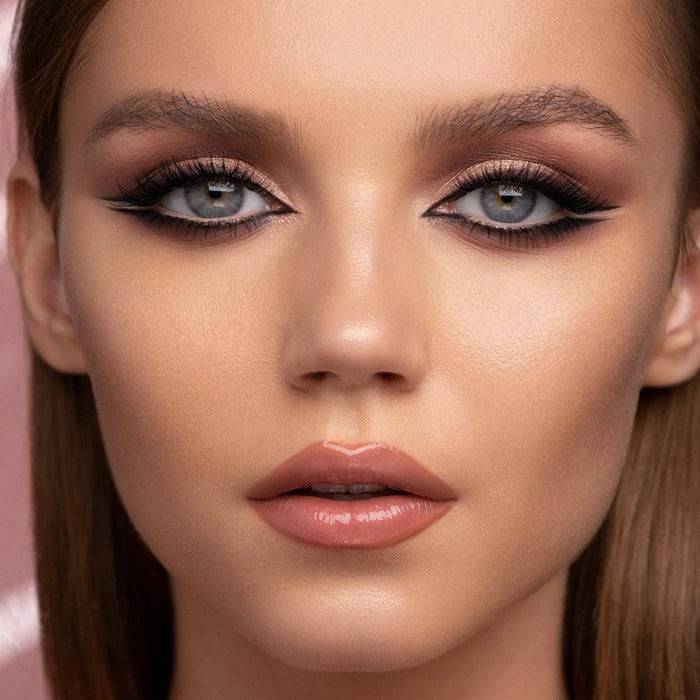 I Need a Rose Lip Gloss shade 'Daphne' model look.