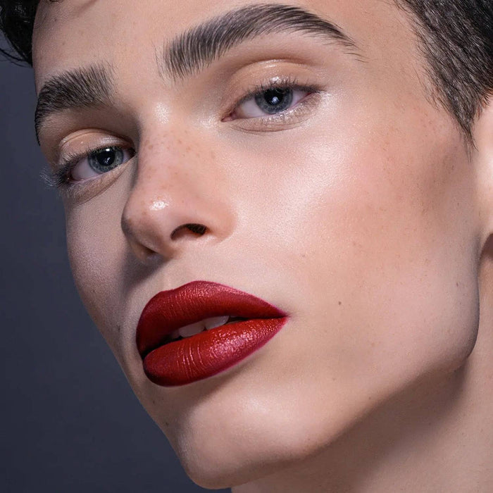 I Need a Rouge Lip Styletto model look on a dark gray background.
