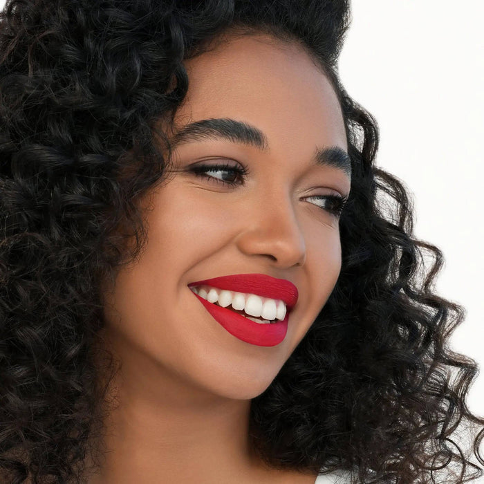 I Need a Rouge Matte Liquid Lipstick model look on a white background.