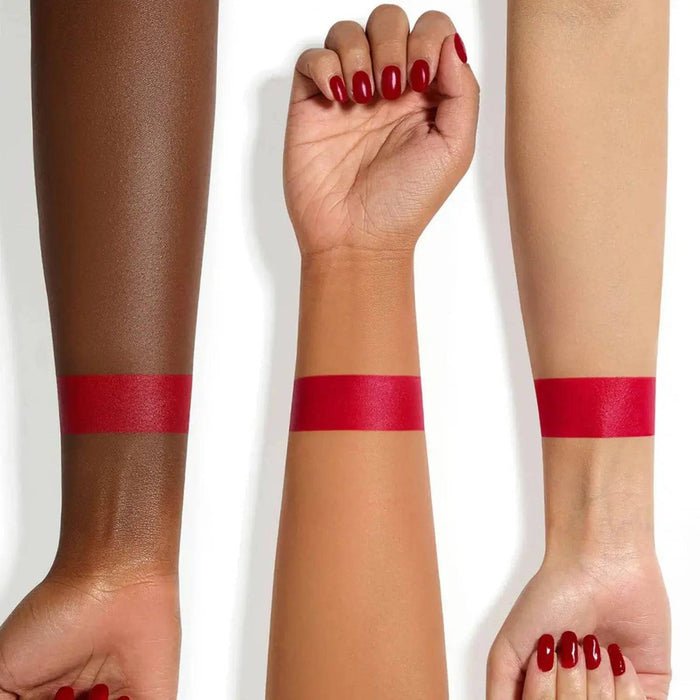 I Need a Rouge Matte Liquid Lipstick arm swatches on different skin tones.