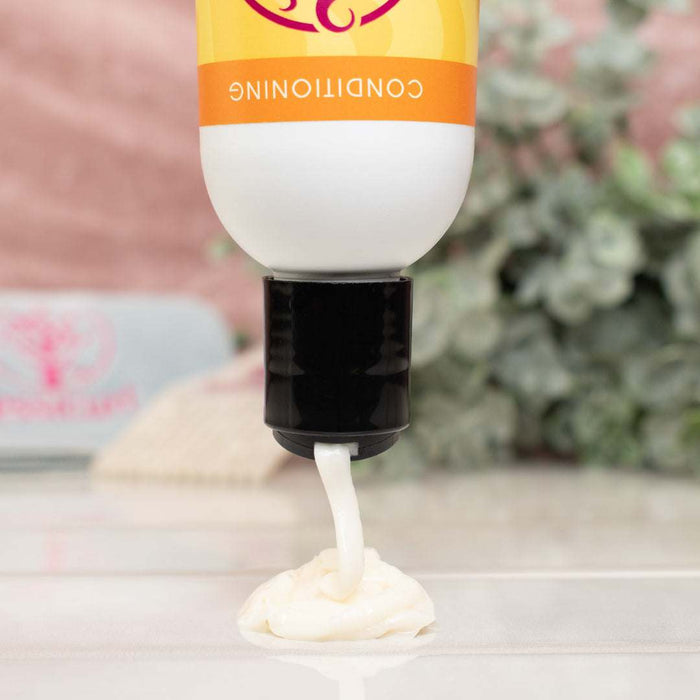 Jessicurl Too Shea! Extra Moisturizing Conditioner bottle for medium to thick curly hair with shea butter and natural oils