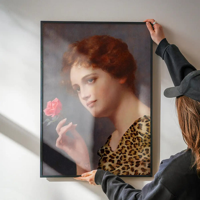 Leopard Print Lady Painting Print being hung on a wall in a black frame