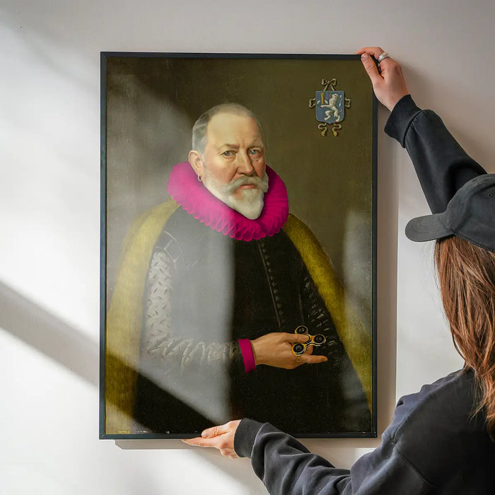Lord Fidget Spinner Print being hung on a wall in a black frame