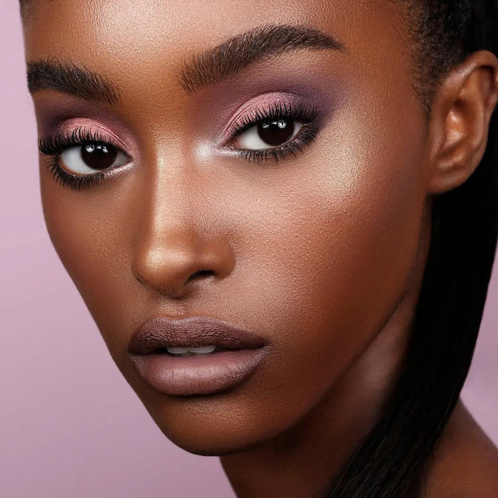Love Cheek Duo model look on a light purple background.
