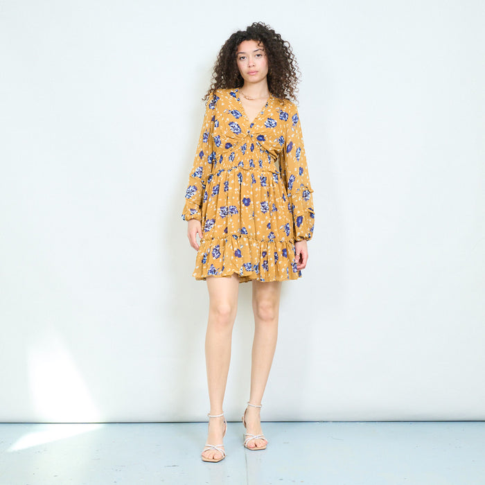Mustard floral twist front mini dress with ruffle hem wholesale