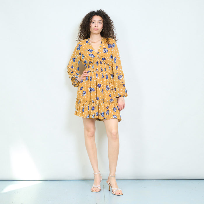 Mustard floral twist front mini dress with ruffle hem wholesale