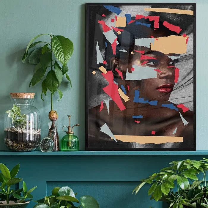 Paper Portrait Print black framed on a living room shelf