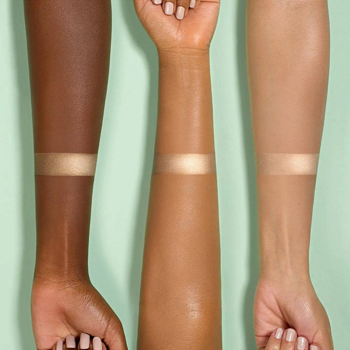Pastel Plexi Glow Highlighter arm swatches on different skin tones.