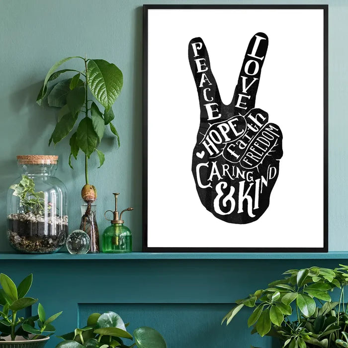 Peace Fingers Typography Print, quote print black framed on a living room shelf