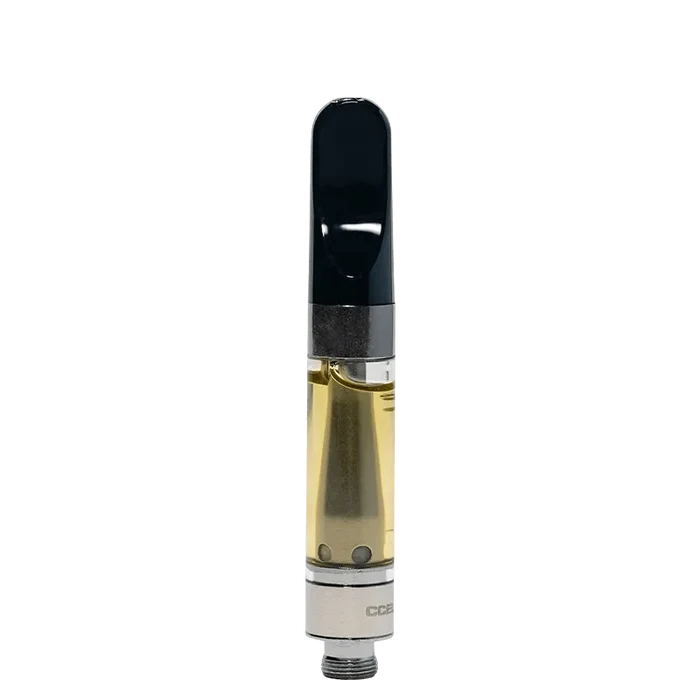 Close-up view of Poppin Peach Diamonds & Sauce, showcasing a clear, cylindrical container with a golden-toned substance inside.