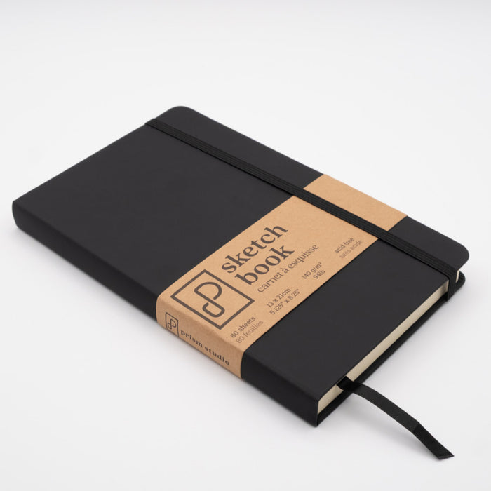 Prism - Sketch Book - 13cm x 21cm - Tuxedo Black. Crafted for versatility-80 sheets acid-free, 94lb paper. At Embellish Away in Bowmanville Ontario Canada