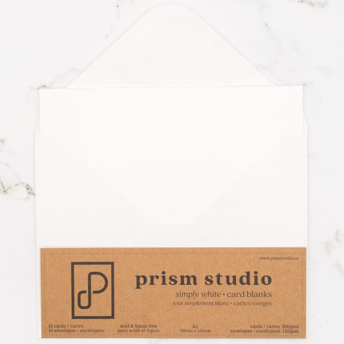 Prism Studio - Card Blanks & Envelopes - A2 - 10pc. 10 folded. Acid and lignin-free. Available at Embellish Away located in Bowmanville Ontario Canada.