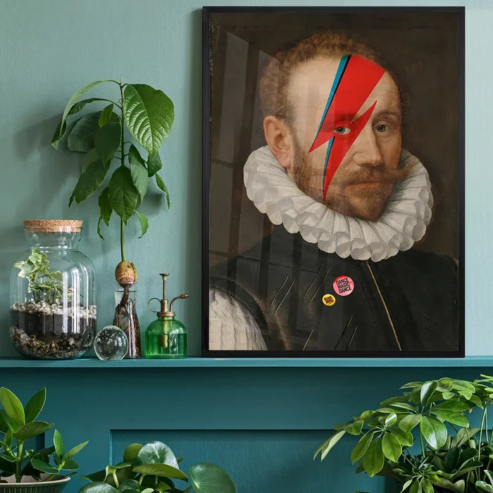 Rebel Bowie Print, quirky altered art print black framed on a living room shelf