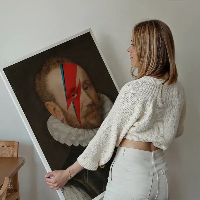 Rebel Bowie Print held up against a living room wall