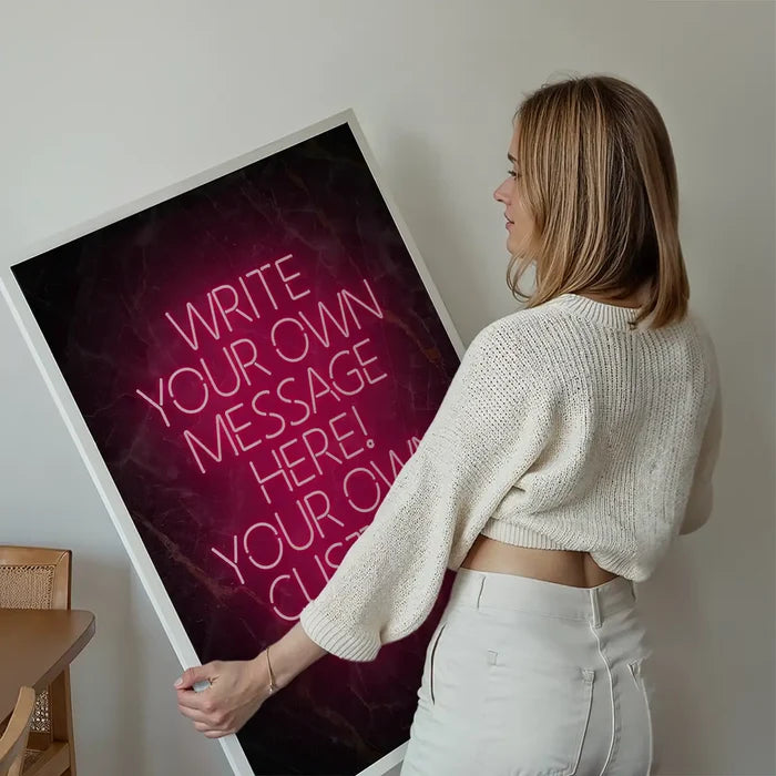 Red Neon Centered Black and Gold Print held up against a living room wall