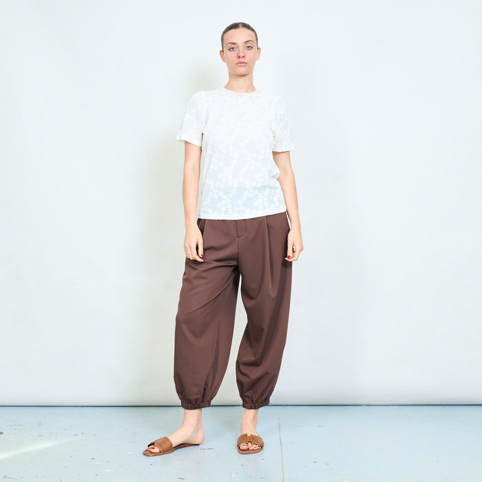 Relaxed tapered leg trousers with elastic cuff hem and clean waistband detail wholesale