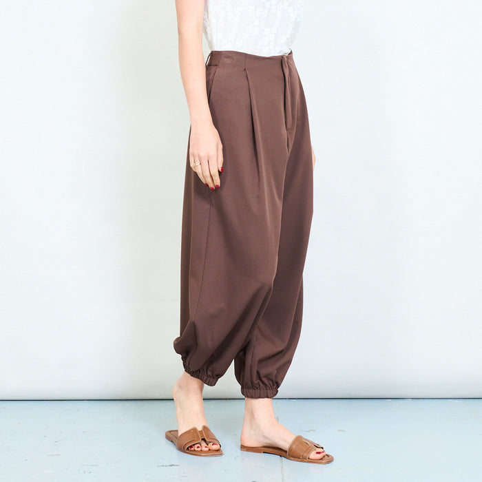 Relaxed tapered leg trousers with elastic cuff hem and clean waistband detail wholesale