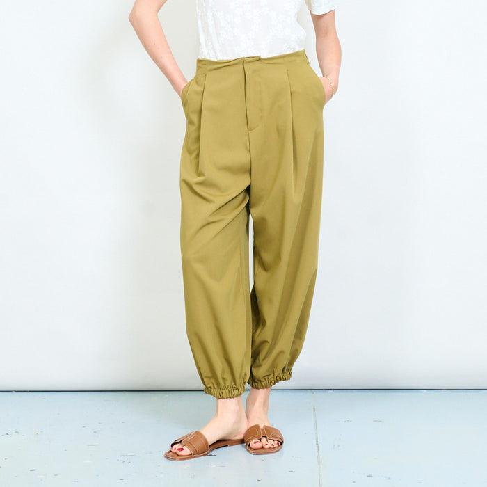 Relaxed tapered leg trousers with elastic cuff hem and clean waistband detail wholesale
