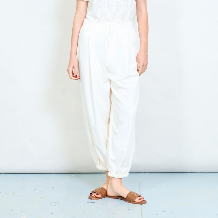 Relaxed tapered leg trousers with elastic cuff hem and clean waistband detail wholesale