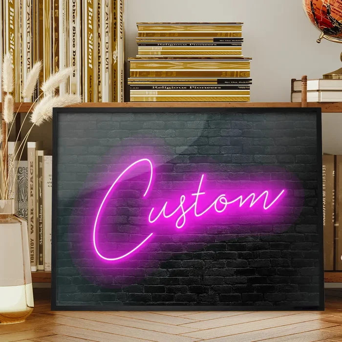 Retro Script Neon Print framed on a living room bookshelf