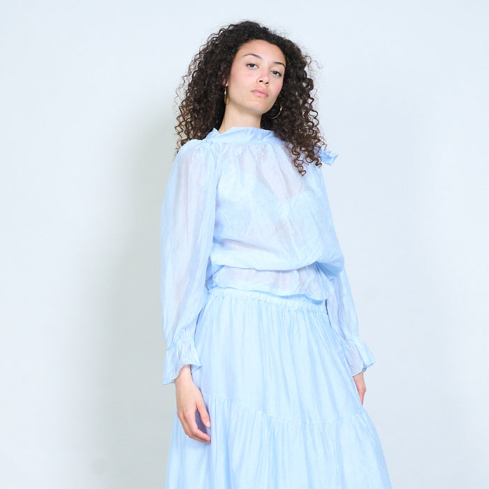 Sheer layered blouse with side tie neckline and elastic hem detail wholesale