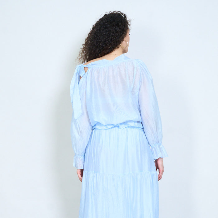Sheer layered blouse with side tie neckline and elastic hem detail wholesale