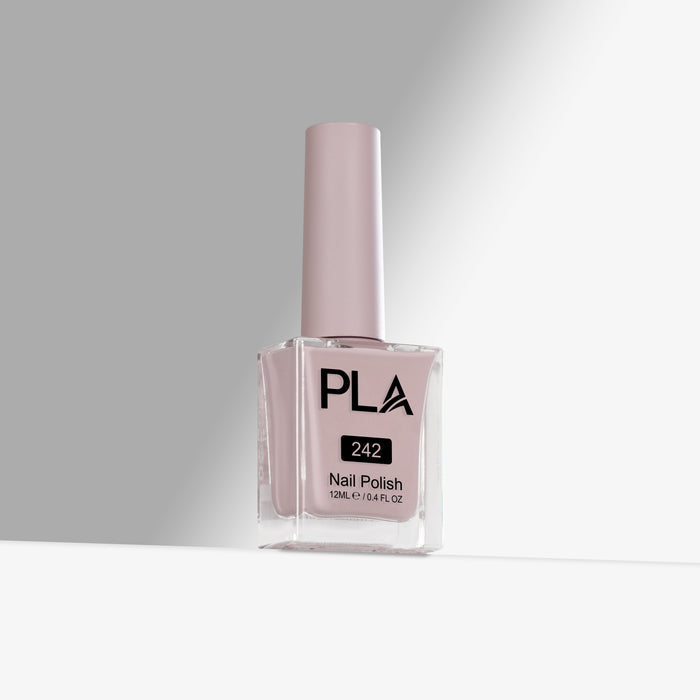 Pink nail polish bottle with 'PLA' branding on a gray background