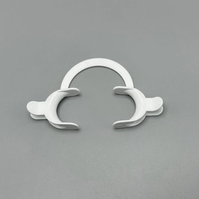 White cheek retractor with flexible plastic design