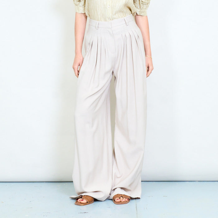 Soft drape pleated front wide leg trousers with tailored waistband detail wholesale