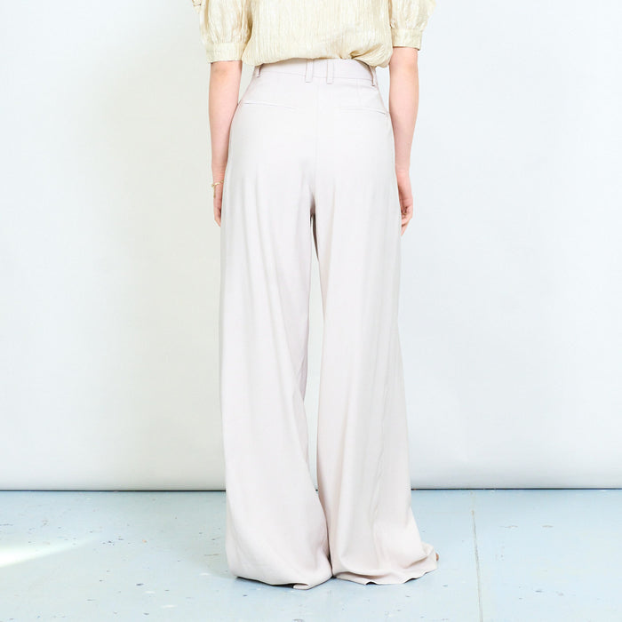 Soft drape pleated front wide leg trousers with tailored waistband detail wholesale
