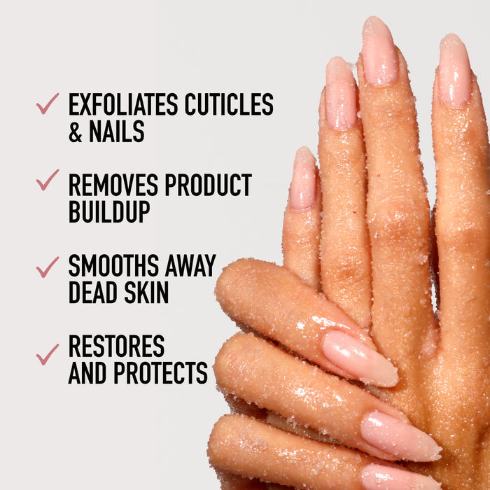 Hands treated with LONDONTOWN's Soft Touch Nail Scrub, highlighting manicured nails. It exfoliates cuticles, removes buildup, smooths skin, and restores protection.