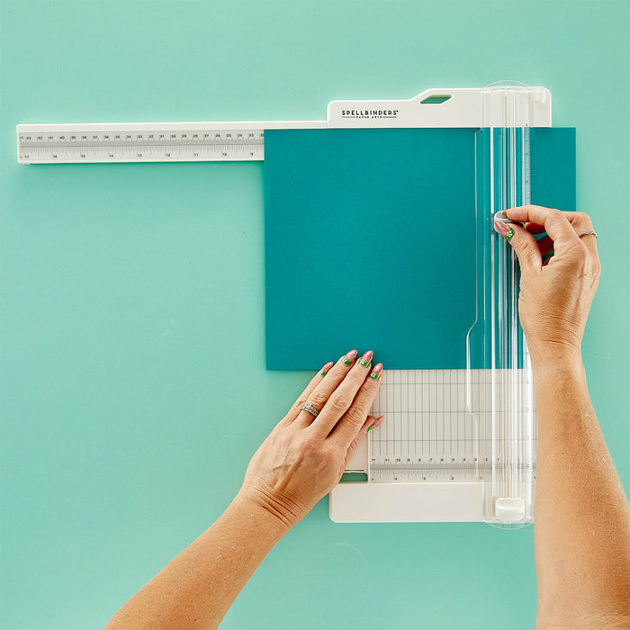 Spellbinders - Tool - 12" Paper Trimmer & Scorer. 6 x 12-inch trimmer; includes one cutting blade and one scoring blade. Available at Embellish Away in Bowmanville Ontario Canada.