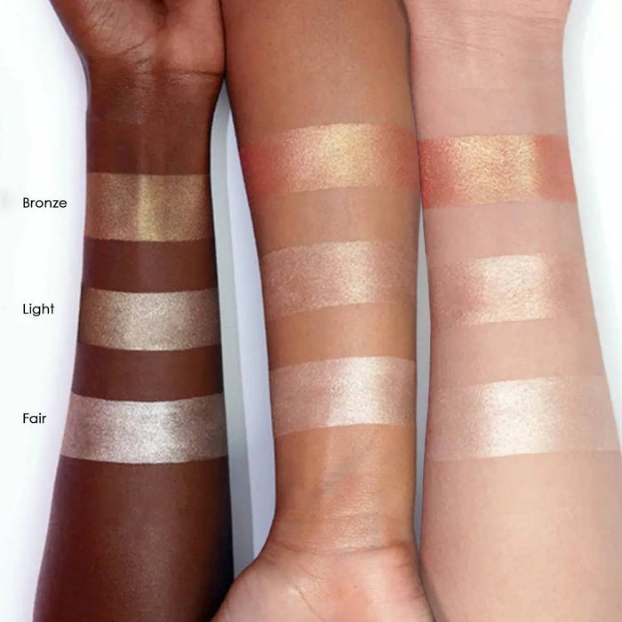 Super Glow Highlighter arm swatches on different skin tones.