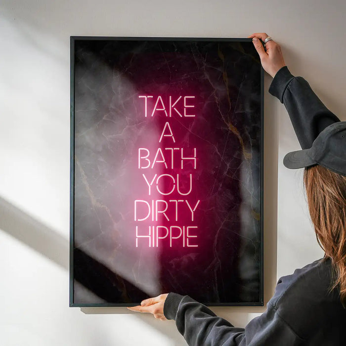Take A Bath Hippie Black Marble Print being hung on a wall in a black frame