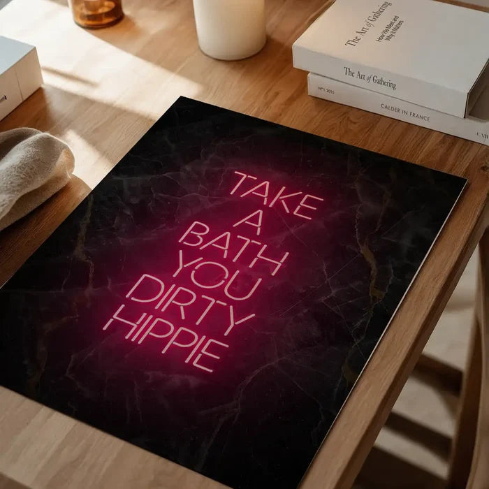 Take A Bath Hippie Black Marble Print, typography print unframed on a home office desk