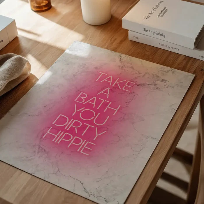 Take A Bath Hippie White Print, typography print unframed on a home office desk