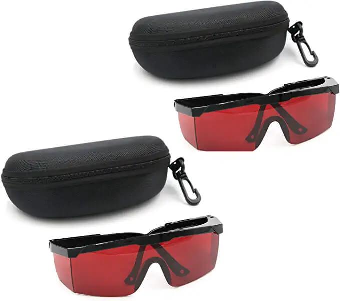 Red safety glasses for professional teeth whitening treatments