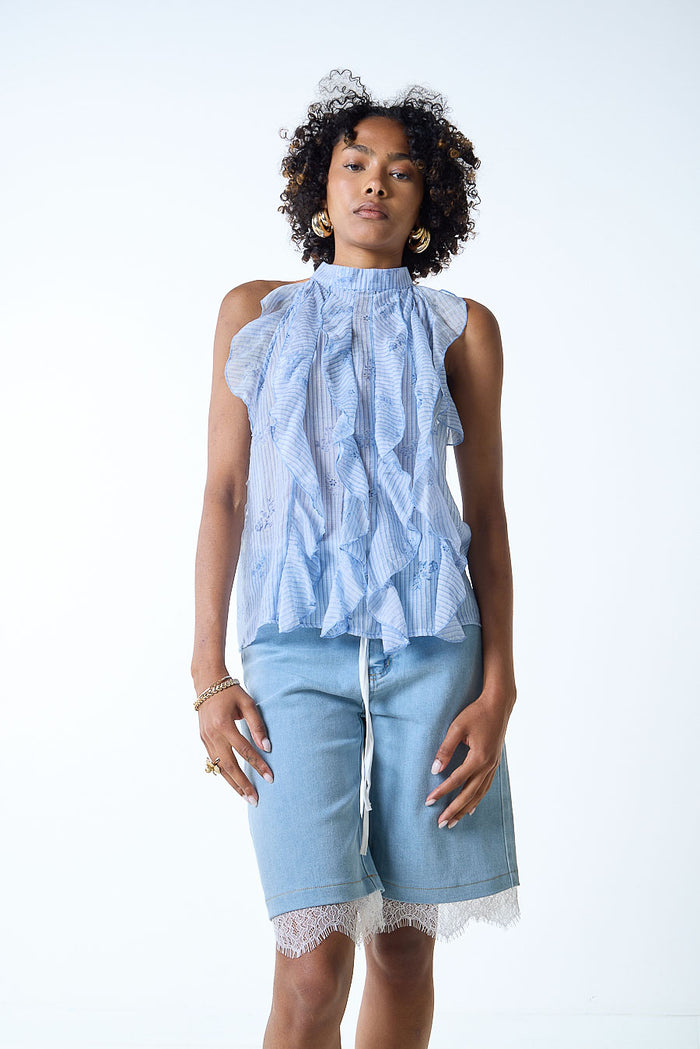 Textured ruffle front sleeveless high neck blouse wholesale