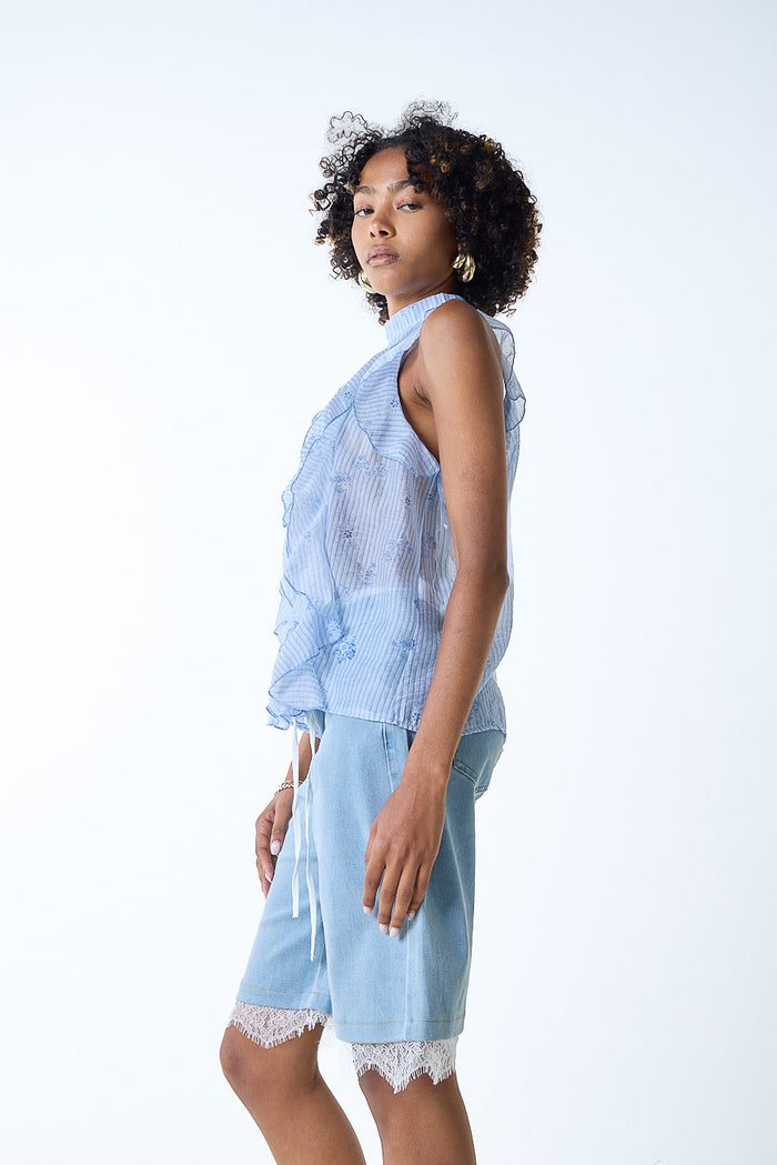 Textured ruffle front sleeveless high neck blouse wholesale