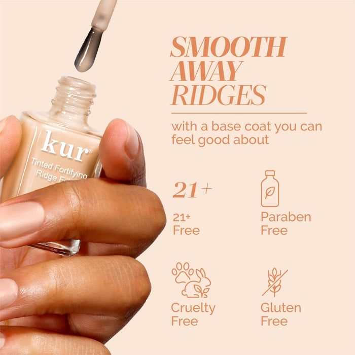A hand holds LONDONTOWN’s Tinted Fortifying Ridge Filler - Apricot Beige. Text notes it's 21+ free, paraben free, cruelty free, gluten free, smooths ridges, and adds a hint of tint for a flawless finish.