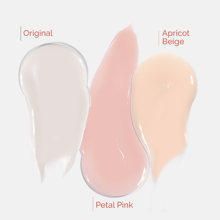 Three swatches of LONDONTOWN Tinted Fortifying Ridge Filler in Original (white), Petal Pink (pink), and Apricot Beige (peach) are displayed on a white background, each showing a hint of tint with smooth, beautiful ridges.