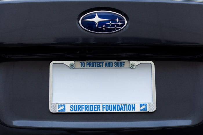 To Protect and Surf Chrome License Plate Frame