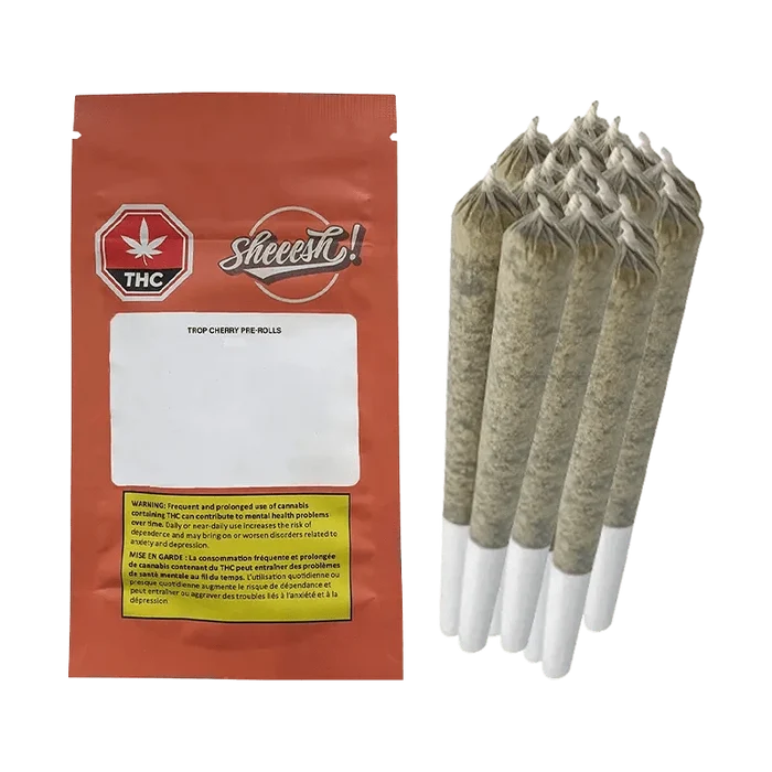 Close-up of the Trop Cherry Pre Rolled 7 x 0.5 g packaging, featuring a red and white design with a prominent cannabis leaf.