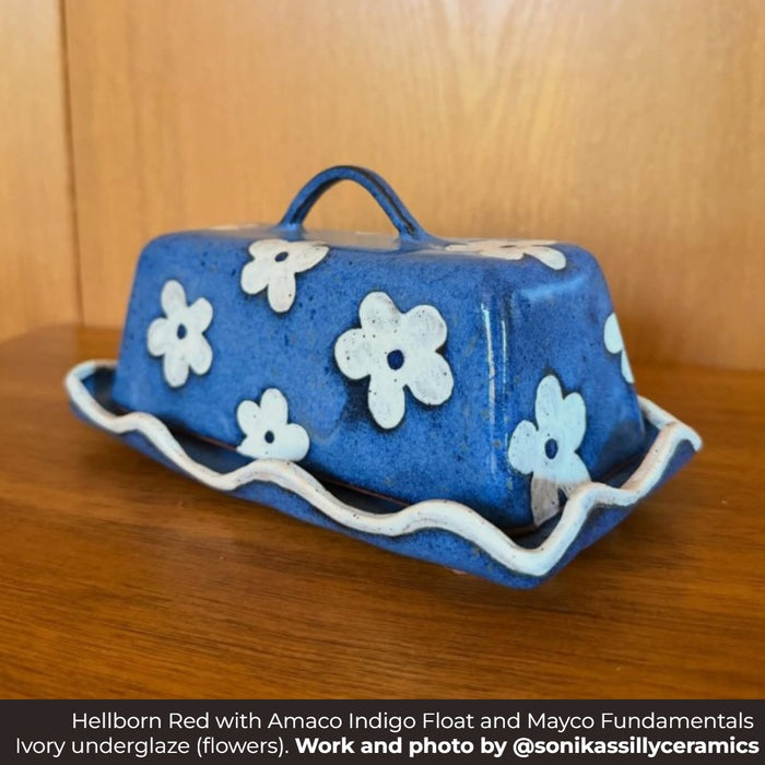 Hellborn Red butter dish in Amaco Indigo Float glaze with Mayco Fundamentals Ivory underglaze flowers