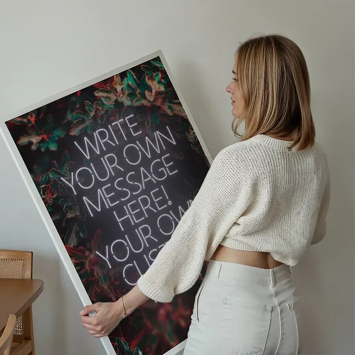 White Neon Centered Leaves Print held up against a living room wall