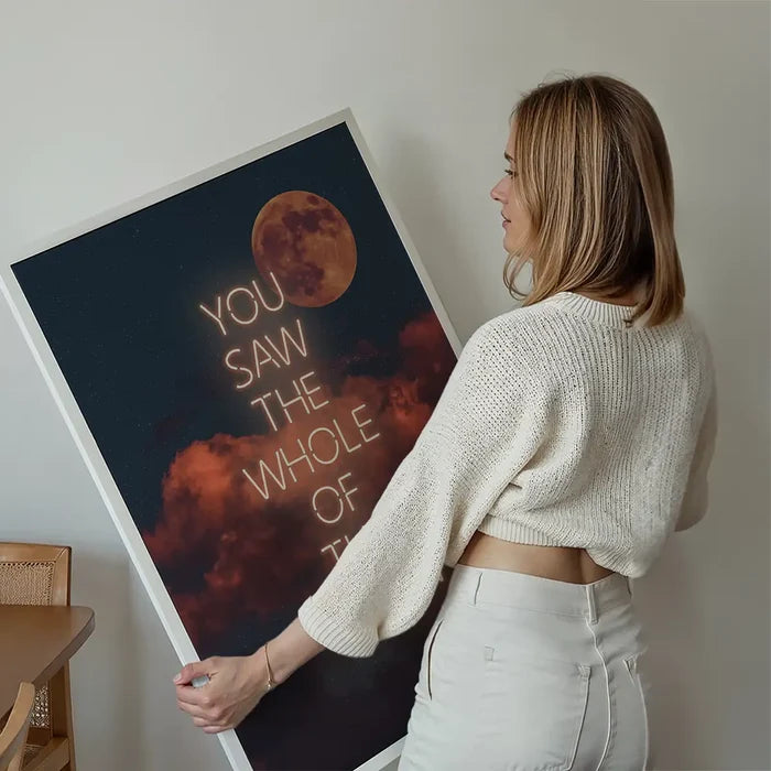 You Saw The Whole Of The Moon Lyrics Print held up against a living room wall